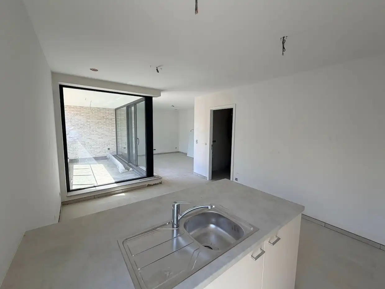 Modern nieuwbouwappartement met 2 slaapkamers en ruim terras in centrum Lubbeek foto 2