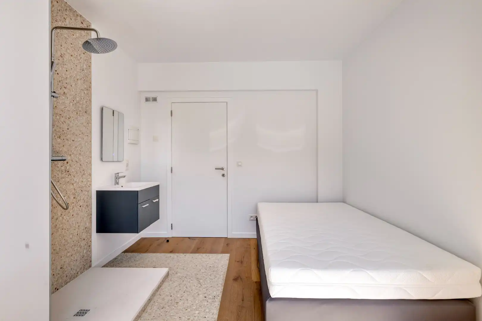 Volledig gerenoveerde studentenkamer in residentie met 15 studentenkamers en een 1slaapkamer appartement in hartje Leuven - EPC label A! foto 12
