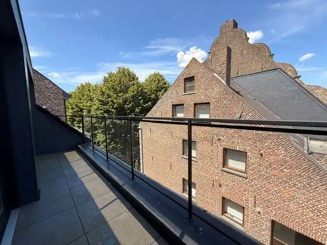 Luxe duplexappartement te huur in het hart van Maaseik, met lift, 2 slaapkamers en 2 terrassen.  foto 21