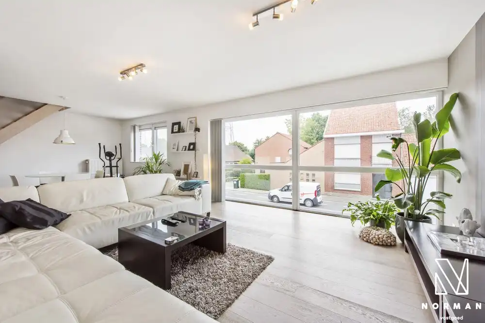Energiezuinig duplexappartement te koop in Hulste met 2 slaapkamers en terras! foto {{pictureIndex}}