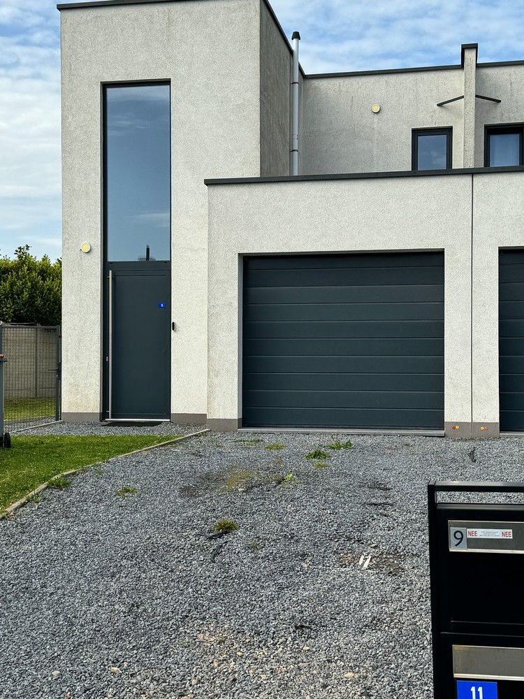 Exclusieve, instapklare woning met modern comfort in het hart van Lanaken foto {{pictureIndex}}