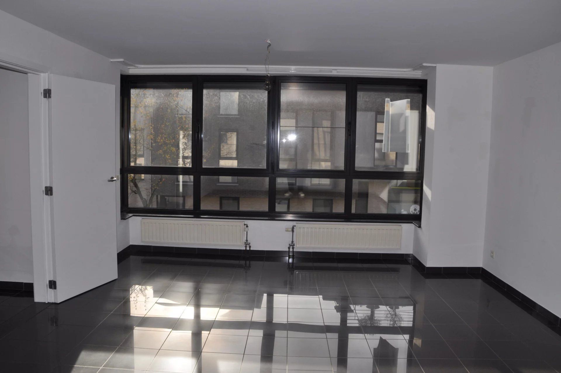 INSTAPKLAAR EN GEZELLIG DUPLEX-APPARTEMENT MET 2 SLPK'S NABIJ CENTRUM HASSELT foto 2