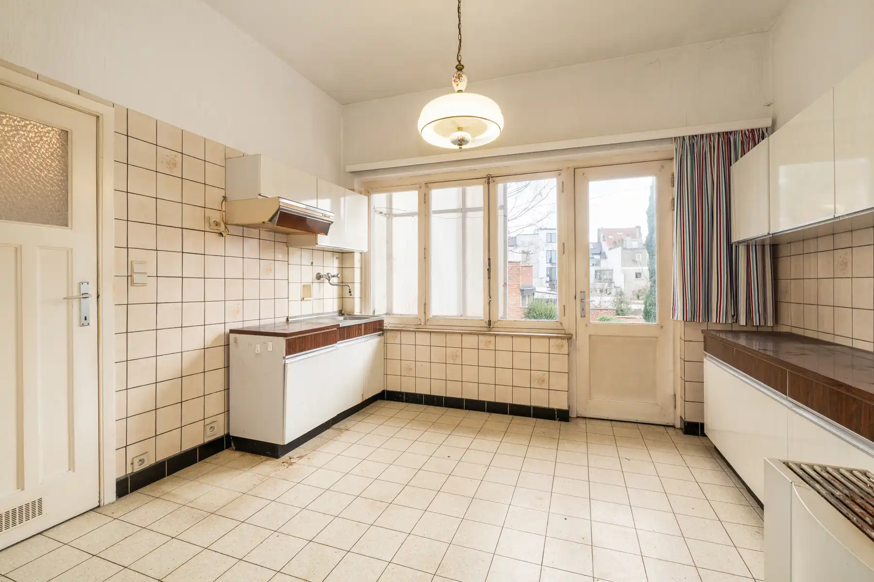 Investeringseigendom met 3 appartementen en tuin foto 8