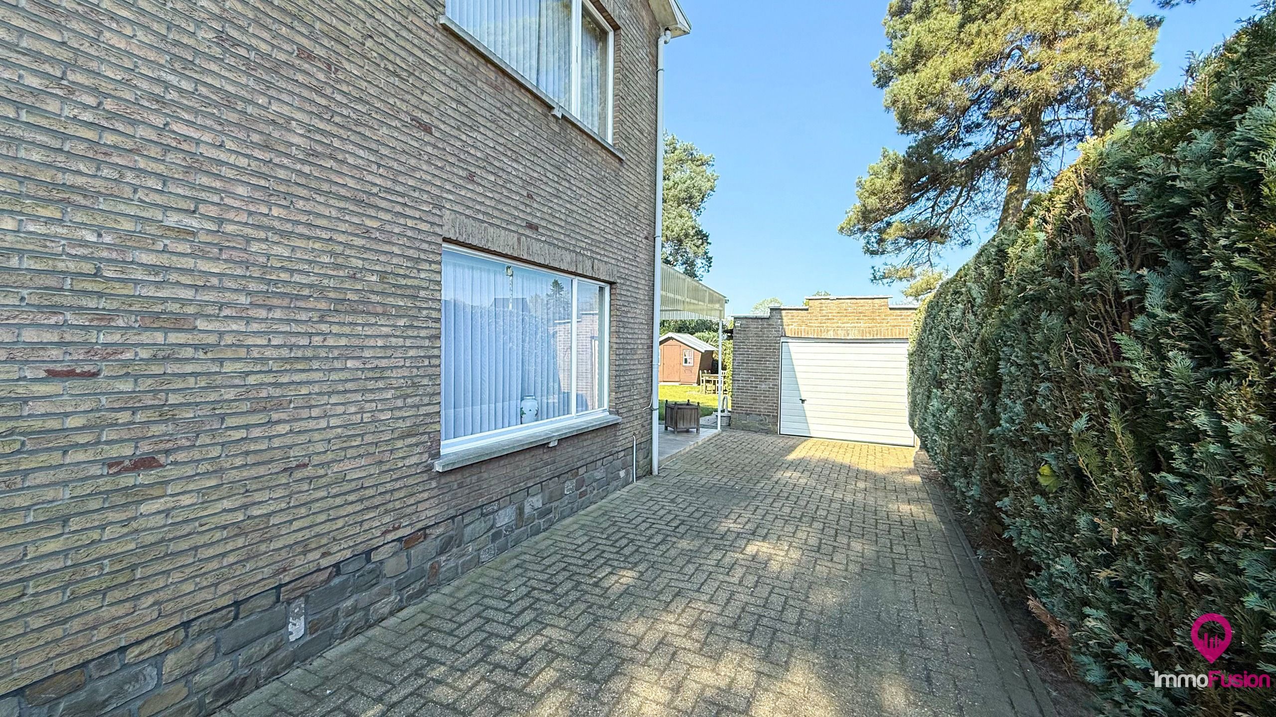 Woning met 4 slpks, garage en omheinde tuin in Beringen! foto 27