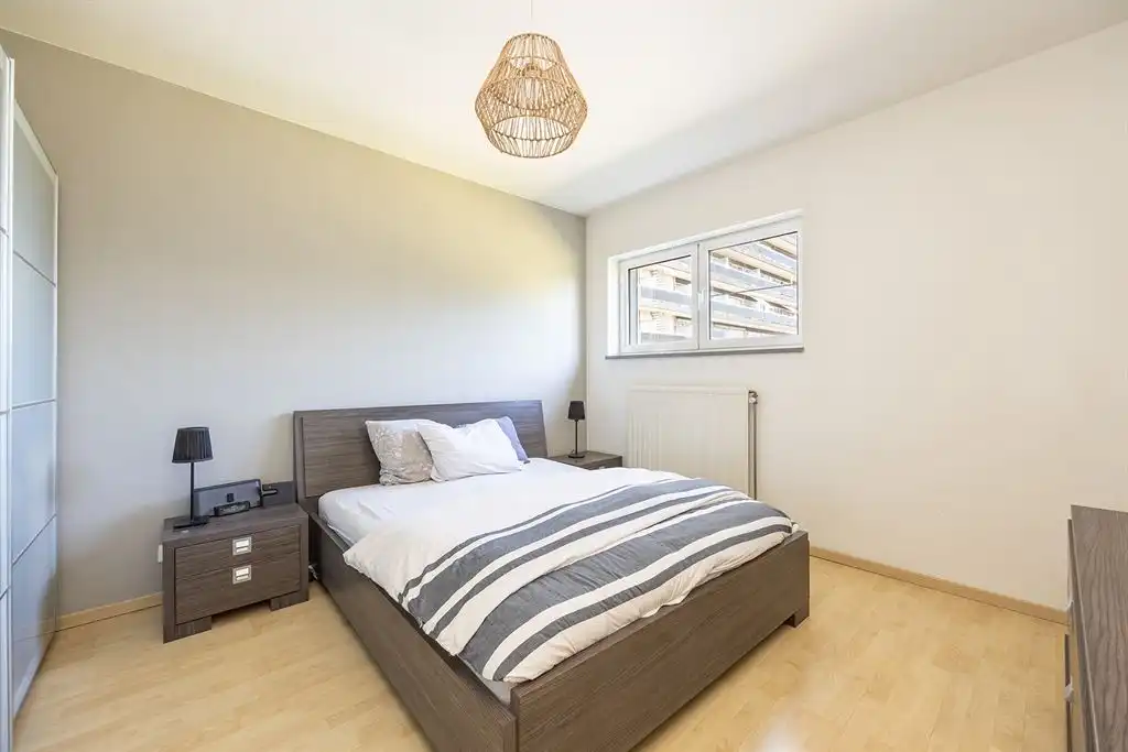 Lichtrijk appartement met 2 slaapkamers, ruim terras en P foto 11
