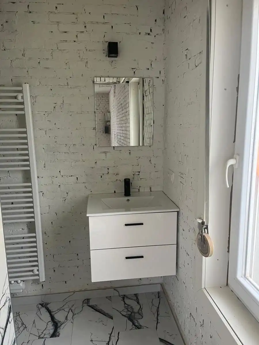 Prachtig gerenoveerd centraal gelegen pand te Malle foto 25