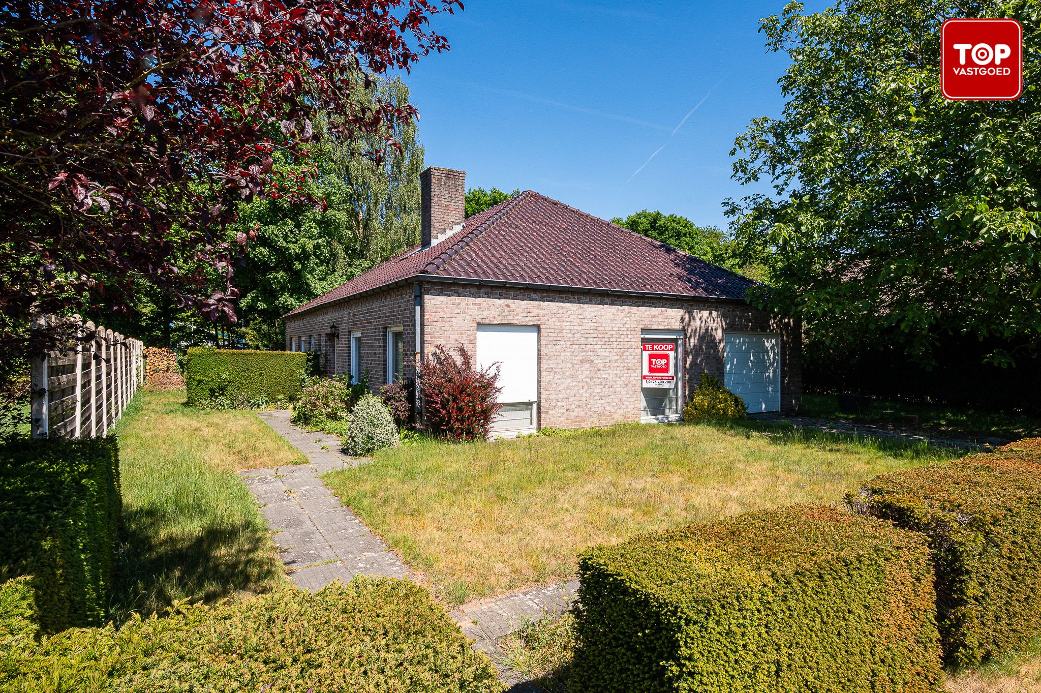 Op te frissen woning met 5 slaapkamers in het rustige Vinderhoute foto {{pictureIndex}}