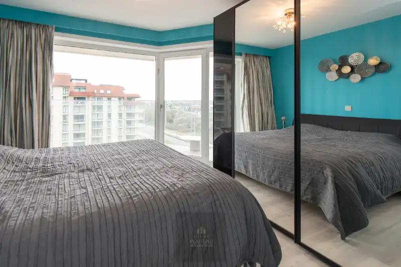 Ruim doorloop-appartement met 2 slaapkamers in de vernieuwde residentie Scorpio op de zeedijk te Nieuwpoort-Bad. foto 28