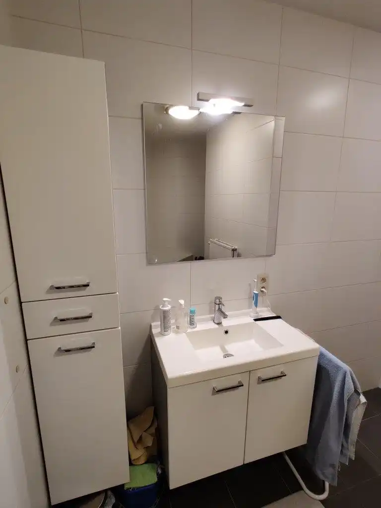 Ruim gelijkvloersappartement met 2 slaapkamers foto 7