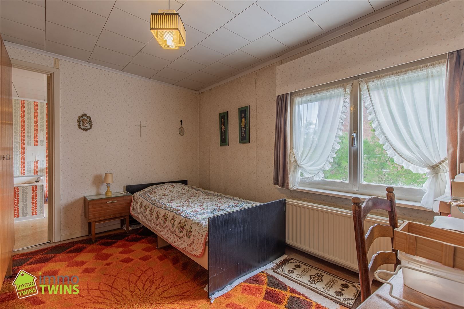 Halfopen bebouwing met 3 slaapkamers en tuin te Grembergen foto 11