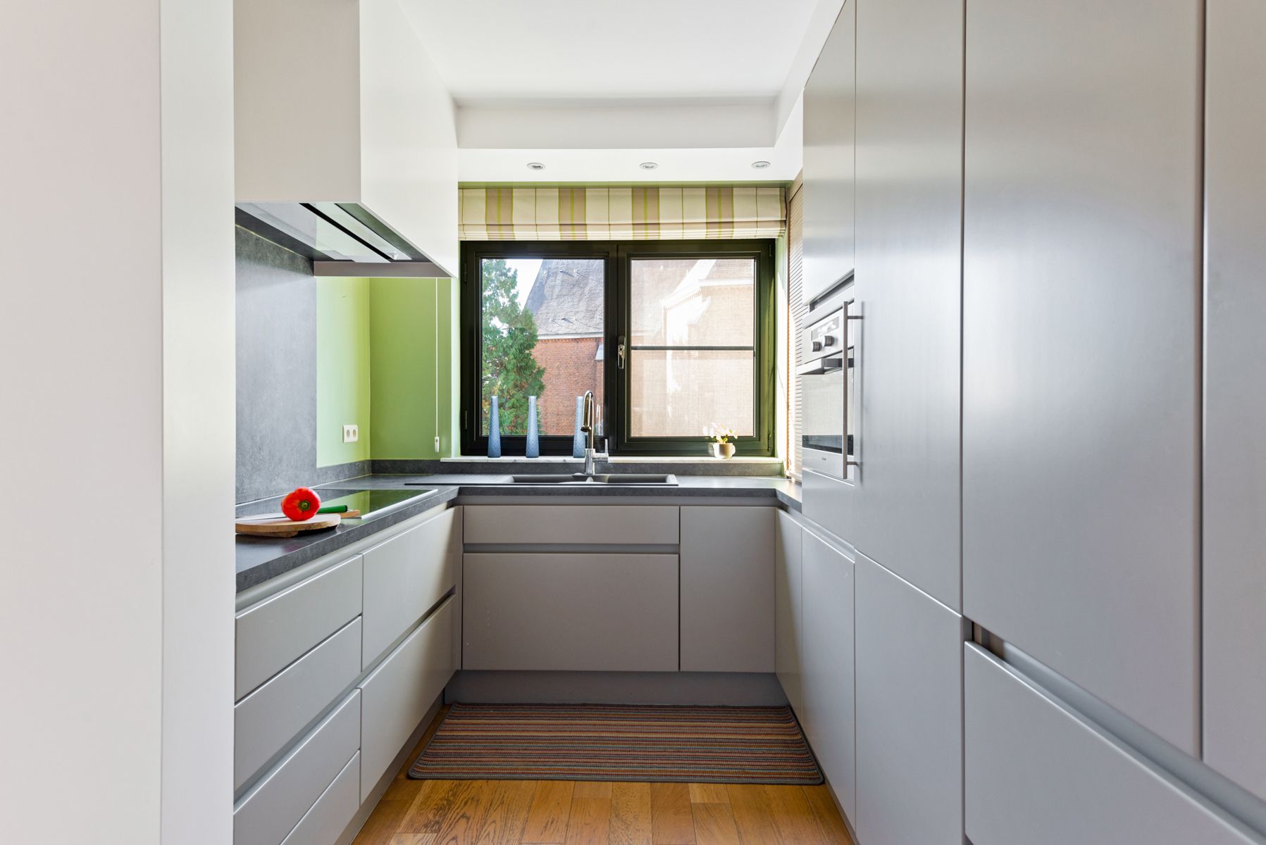 Wonen onder de kerktoren in centrum Aartselaar foto 3