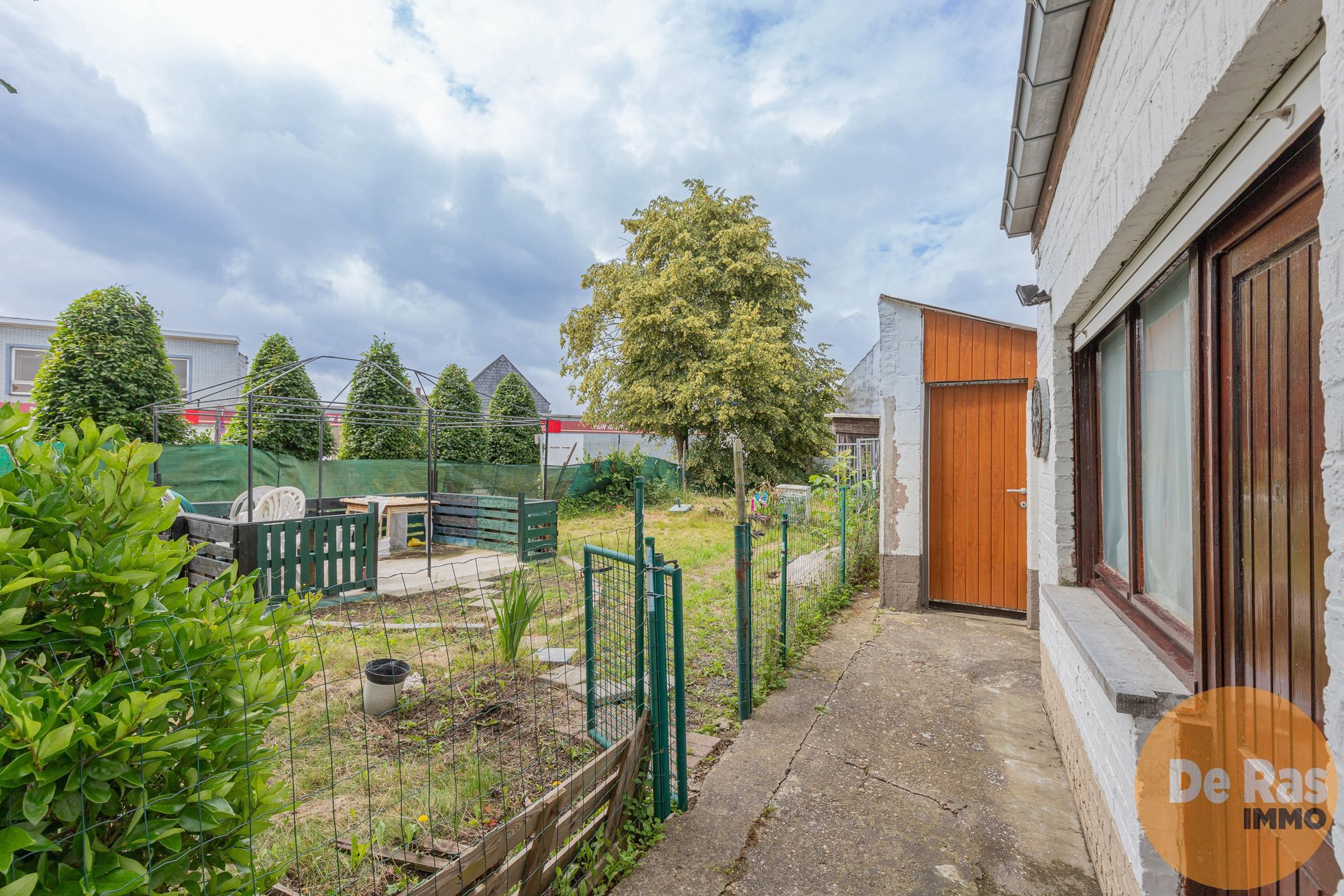 DENDERLEEUW - Halfopen woning met ruime tuin nabij station foto 13