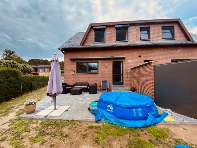 Gezellige halfopen woning met grote tuin foto 16