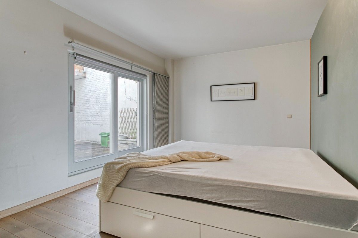 Karaktervol appartement met groot terras (20m²) in het midden van de stad aan het Karmelietenklooster en het Gravensteen. foto 8