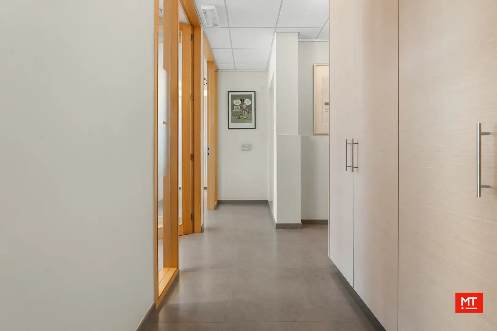 Opbrengsteigendom bestaande uit handelsruimte en 2 appartementen in centrum Beselare foto 2