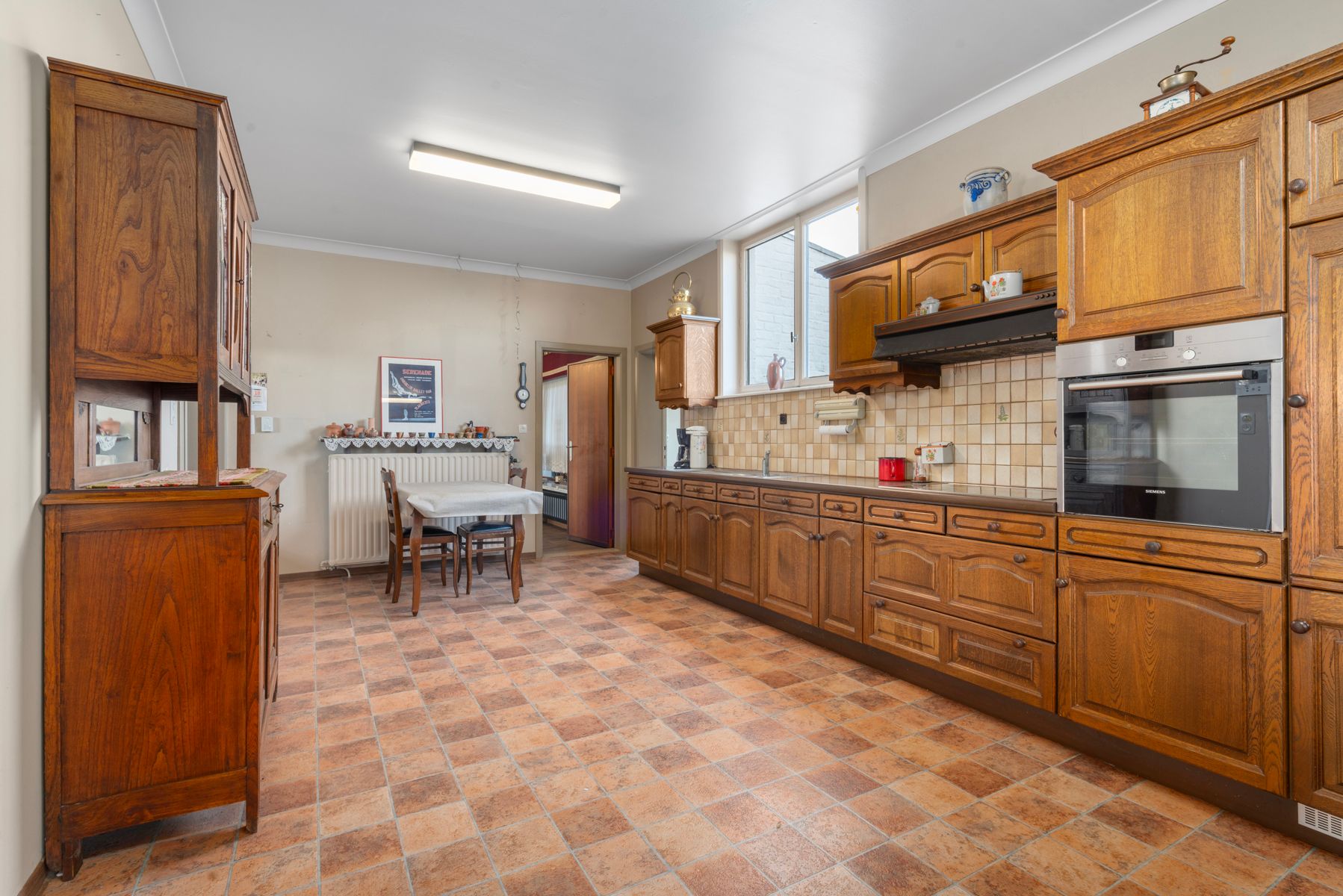 TE KOOP - ruime halfopen bebouwing met 4 slaapkamers foto 6