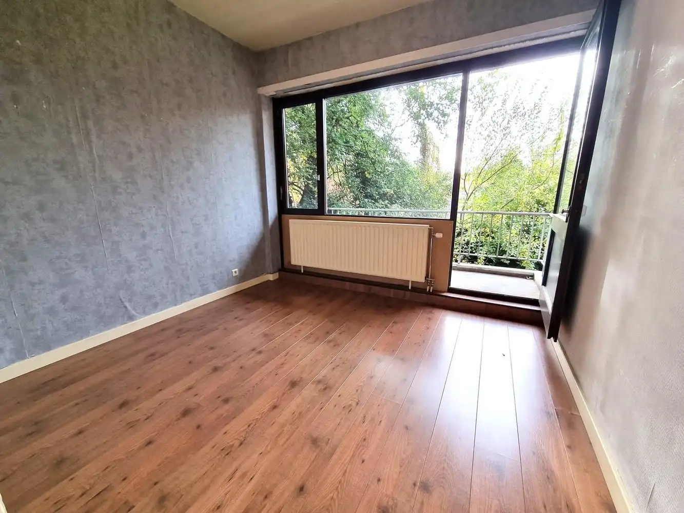 Verzorgd en ruim appartement van 97m², met 2 slaapkamers, terras aan de achterzijde en private kelderberging . foto 5
