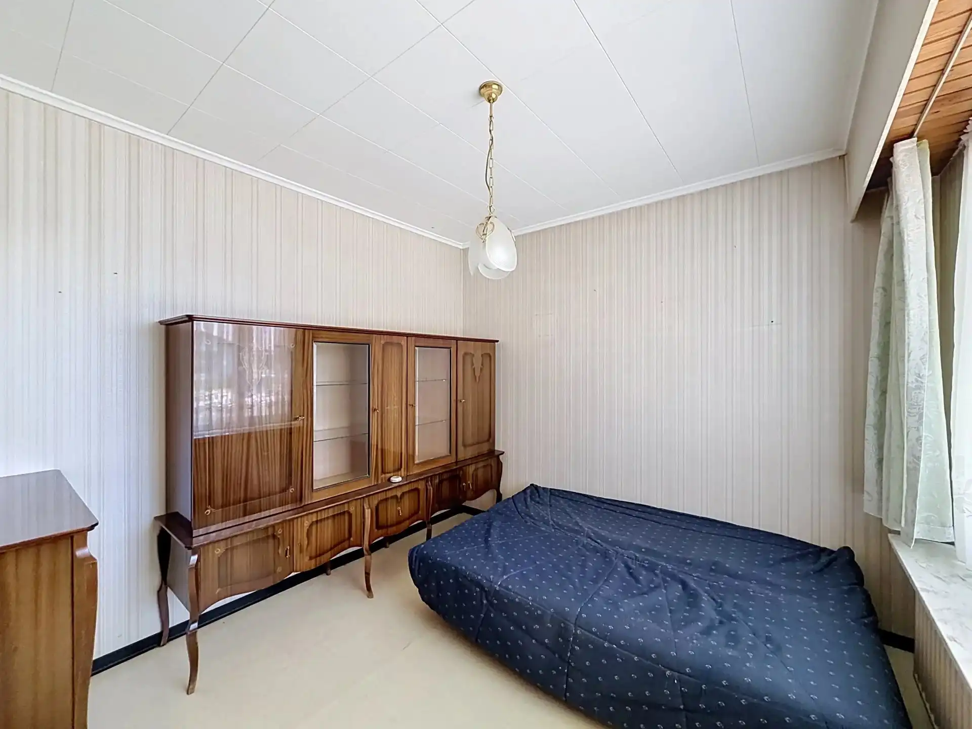 Op te knappen woning met veel mogelijkheden op een mooi perceel. foto 3