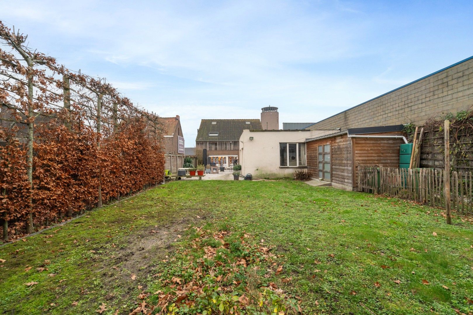 Woning met handelspand te koop in Sleidinge foto {{pictureIndex}}