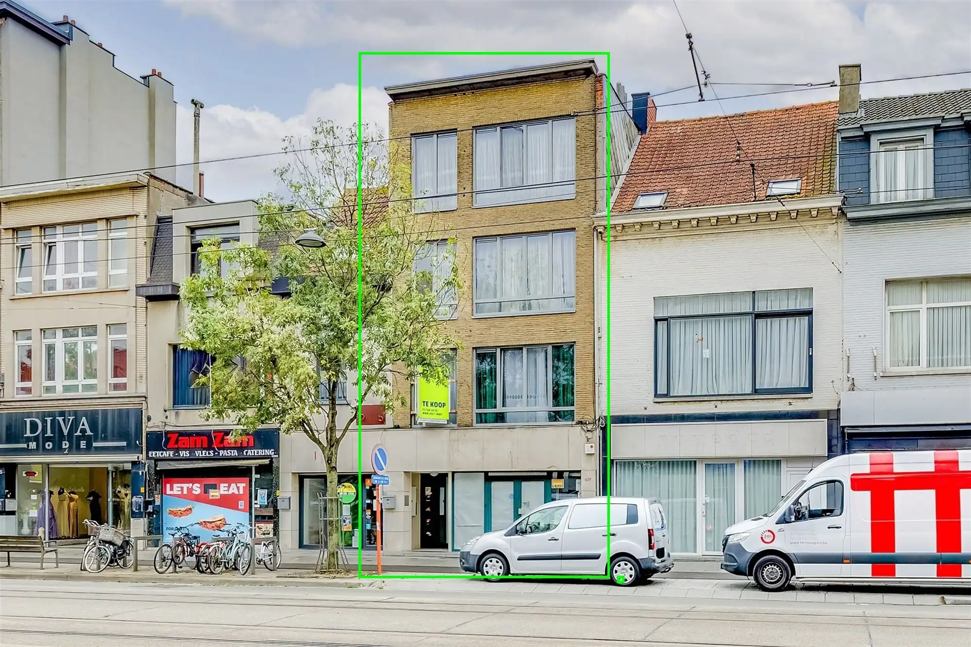 Vergund appartementsgebouw met 3 appt, handelsglvl en tuin in Merksem! foto {{pictureIndex}}