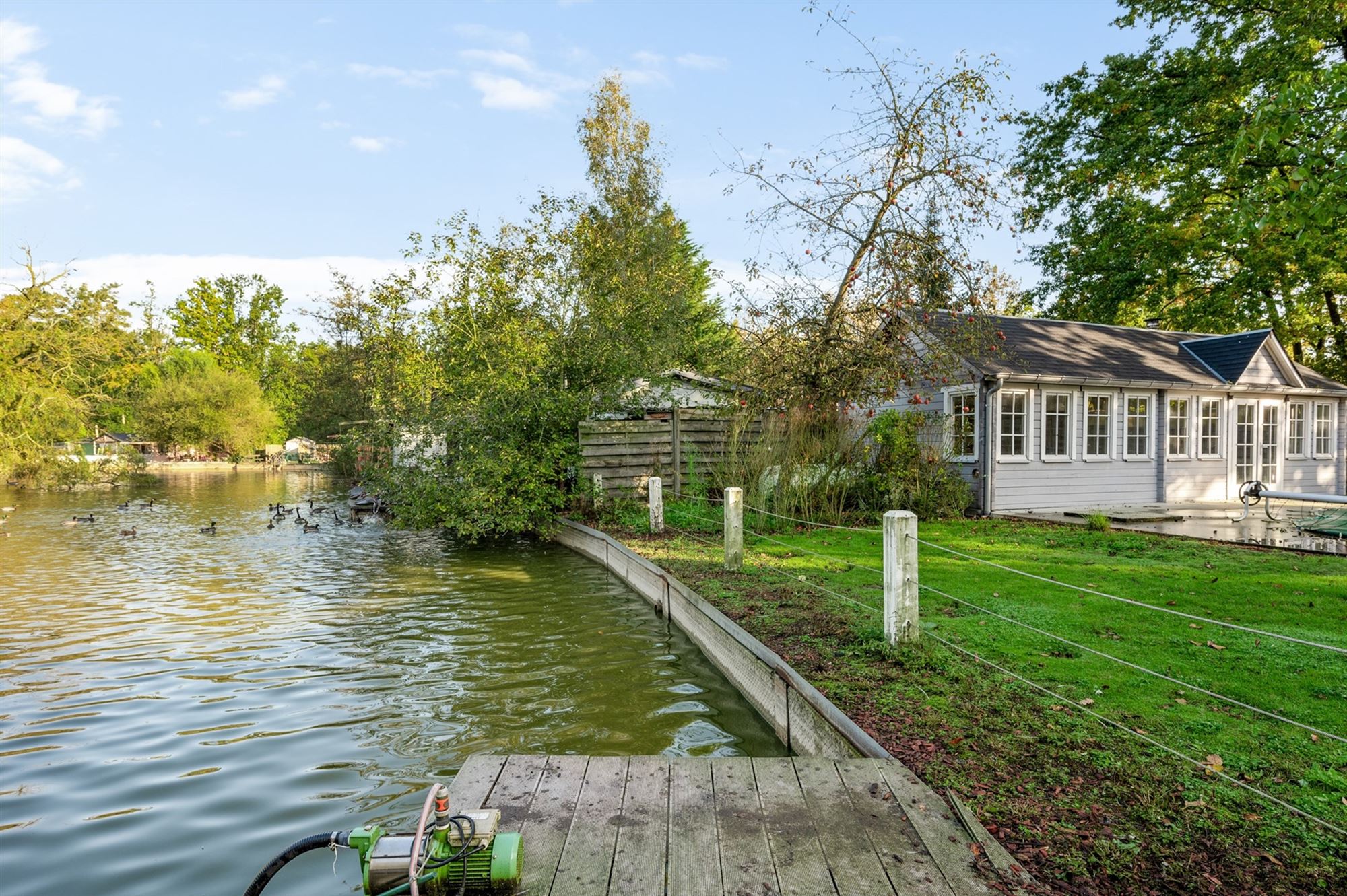 Opbrengsteigendom gelegen in een mooie groene omgeving foto 23