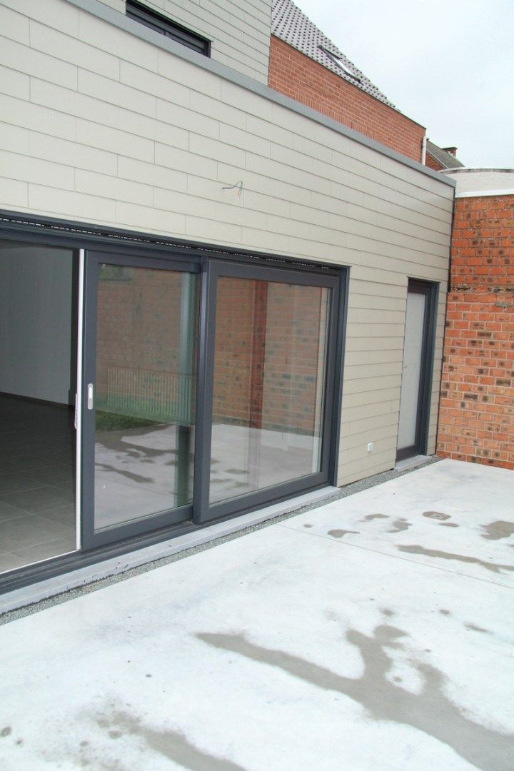 Uiterst ruime, recente woning met 3 slk, garage en tuin in centrum Berlare foto 6