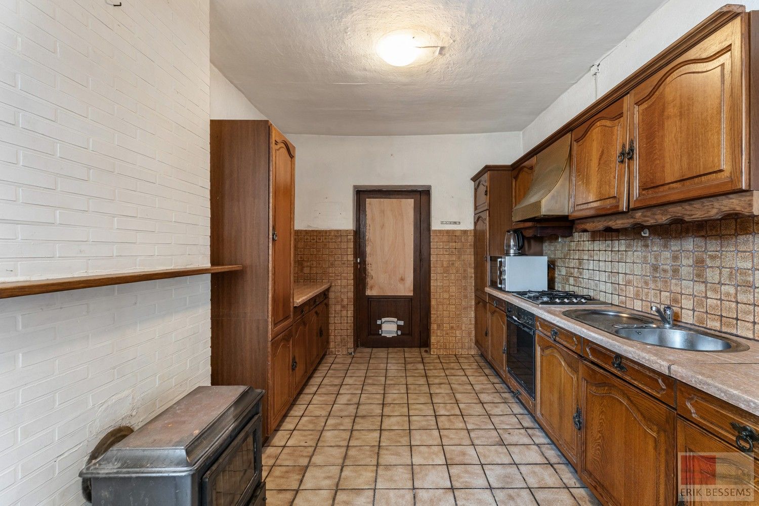 Charmante renovatiewoning met authentieke details en karaktervolle gevel. foto 12