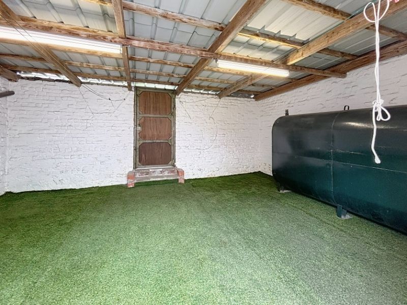 Knusse rijwoning foto 21