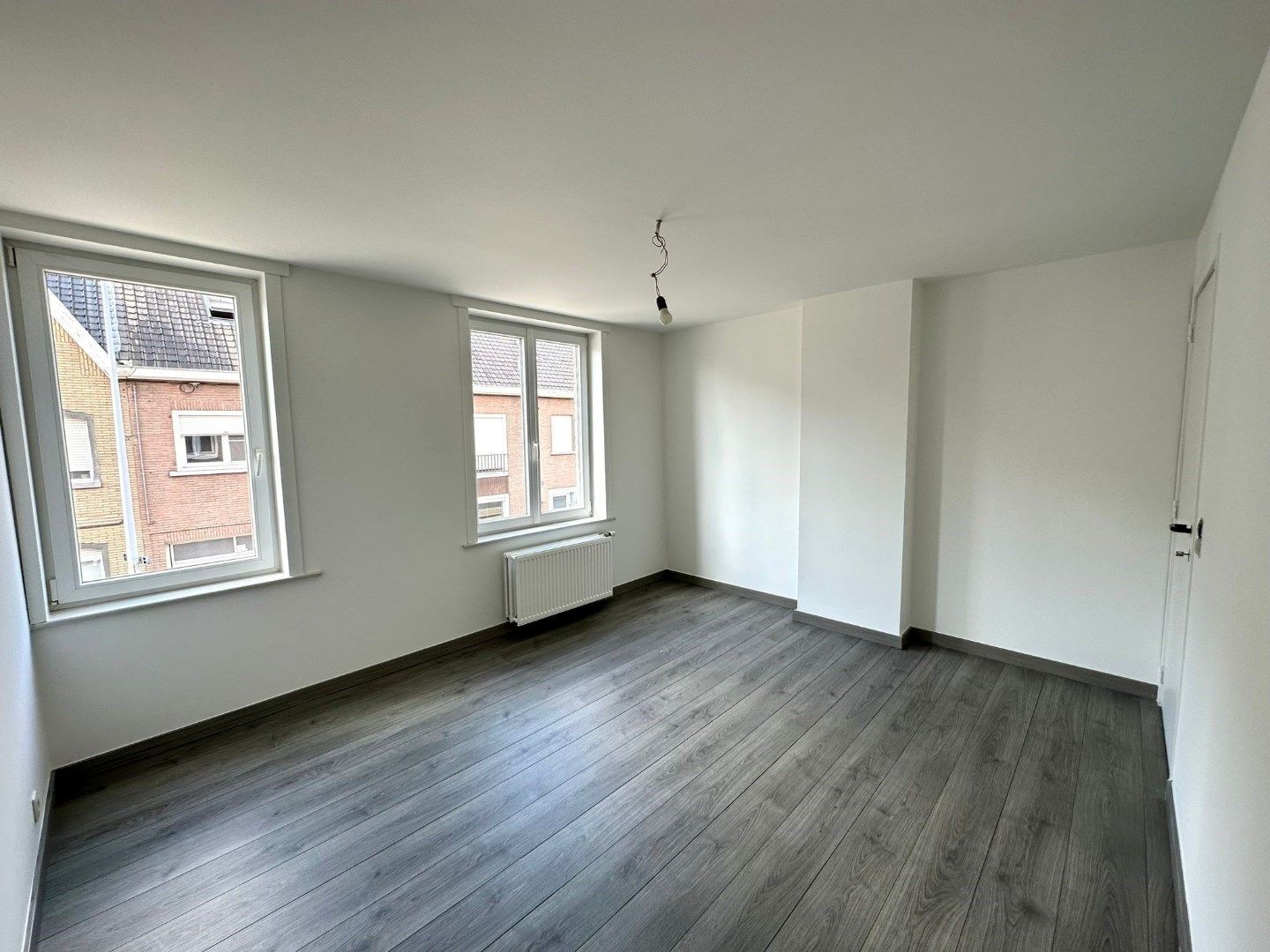 Instapklare en gezellige woning met tuin in het centrum van Roeselare foto 4