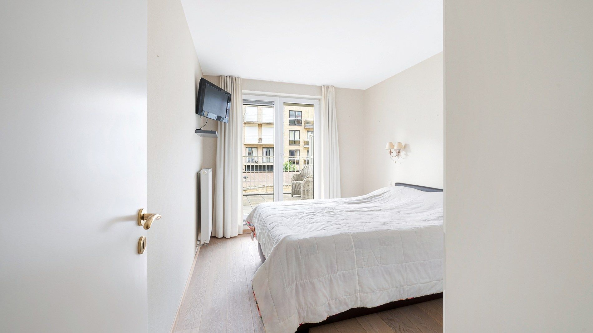 Ruim appartement (100m²) met zongericht terras foto 12