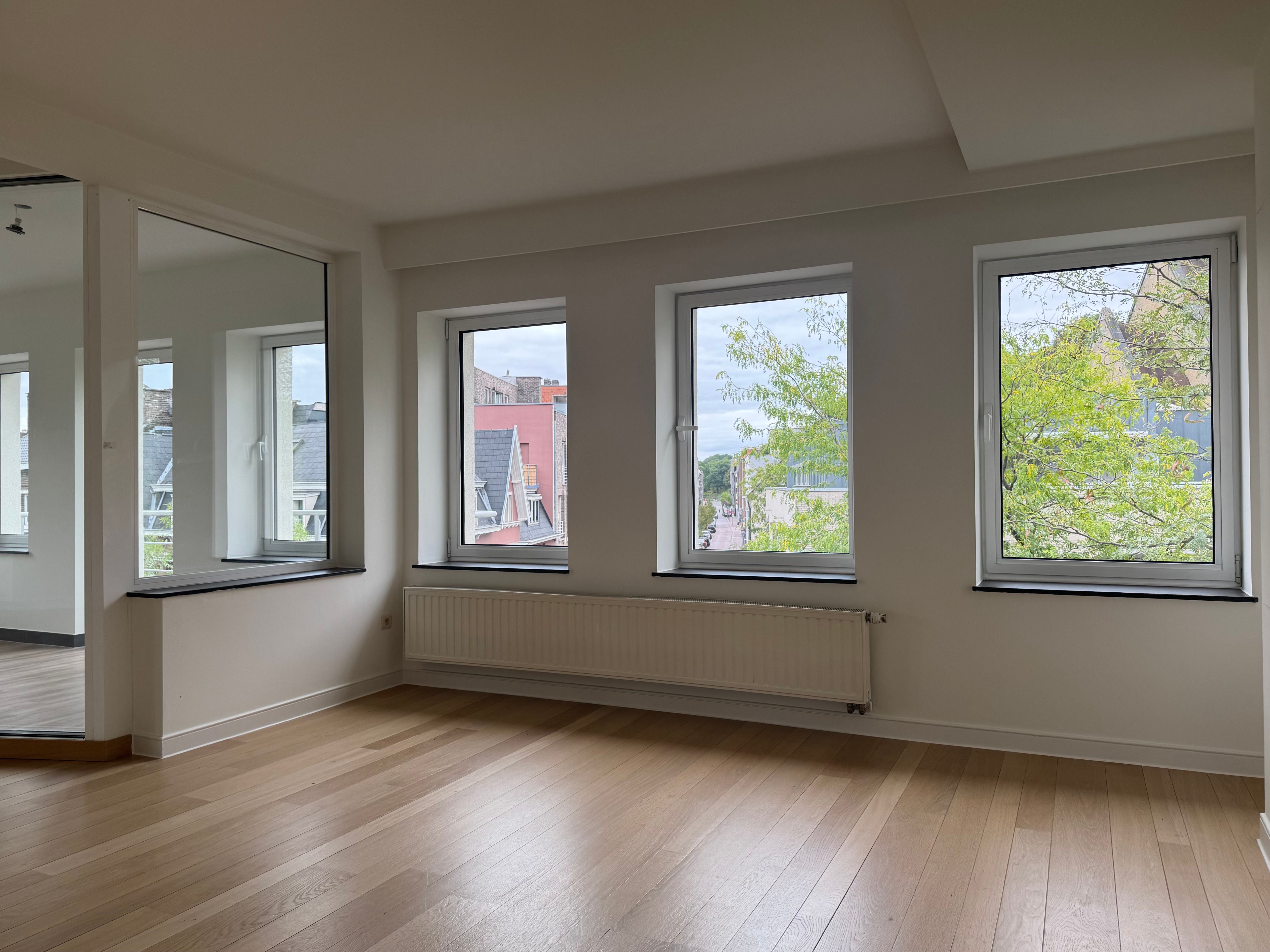 Ruim duplexappartement met tuinkamer en balkon op toplocatie foto 2