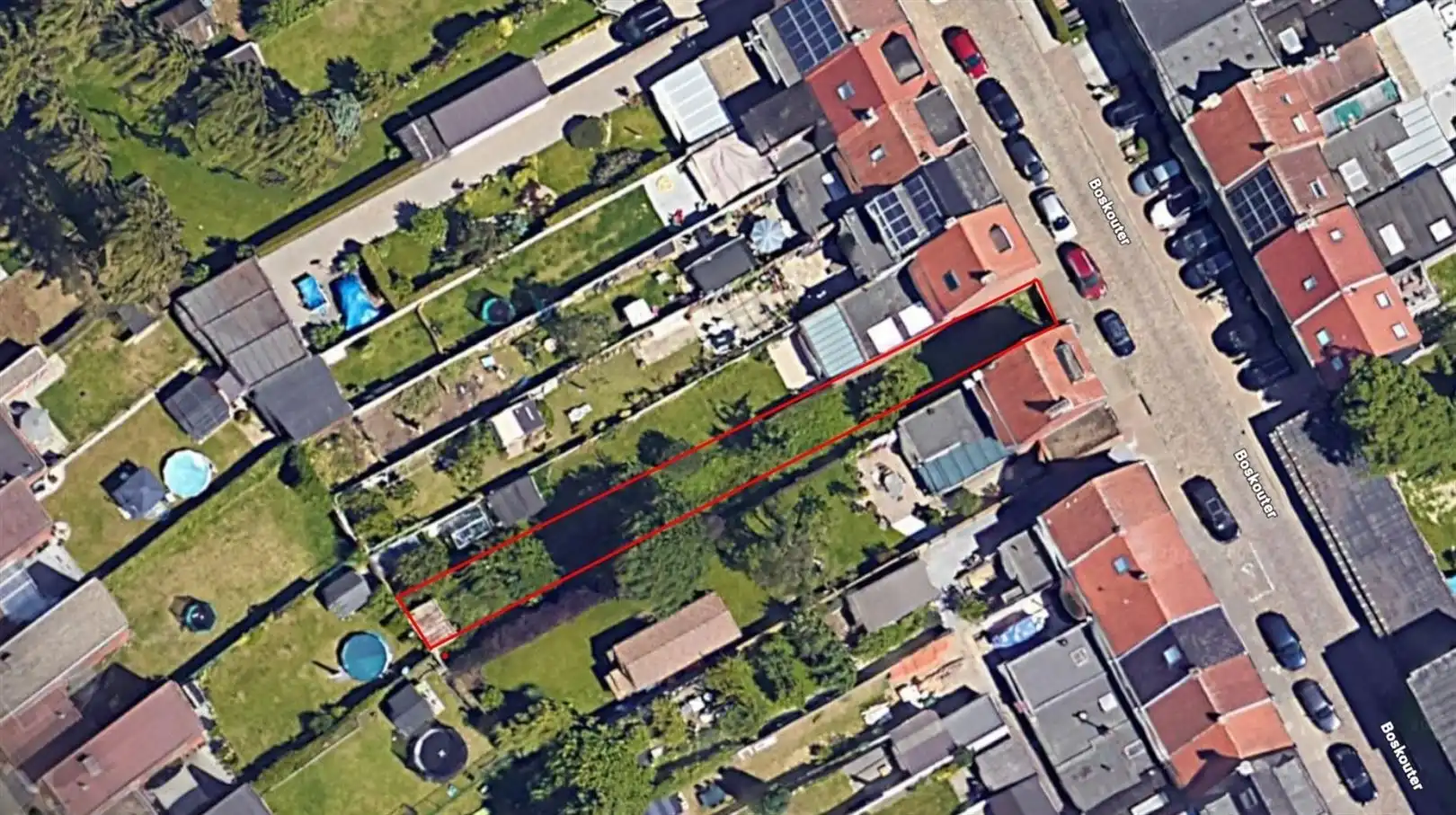 Gunstig gelegen, diep stuk bouwgrond incl.vergunde plannen foto 2