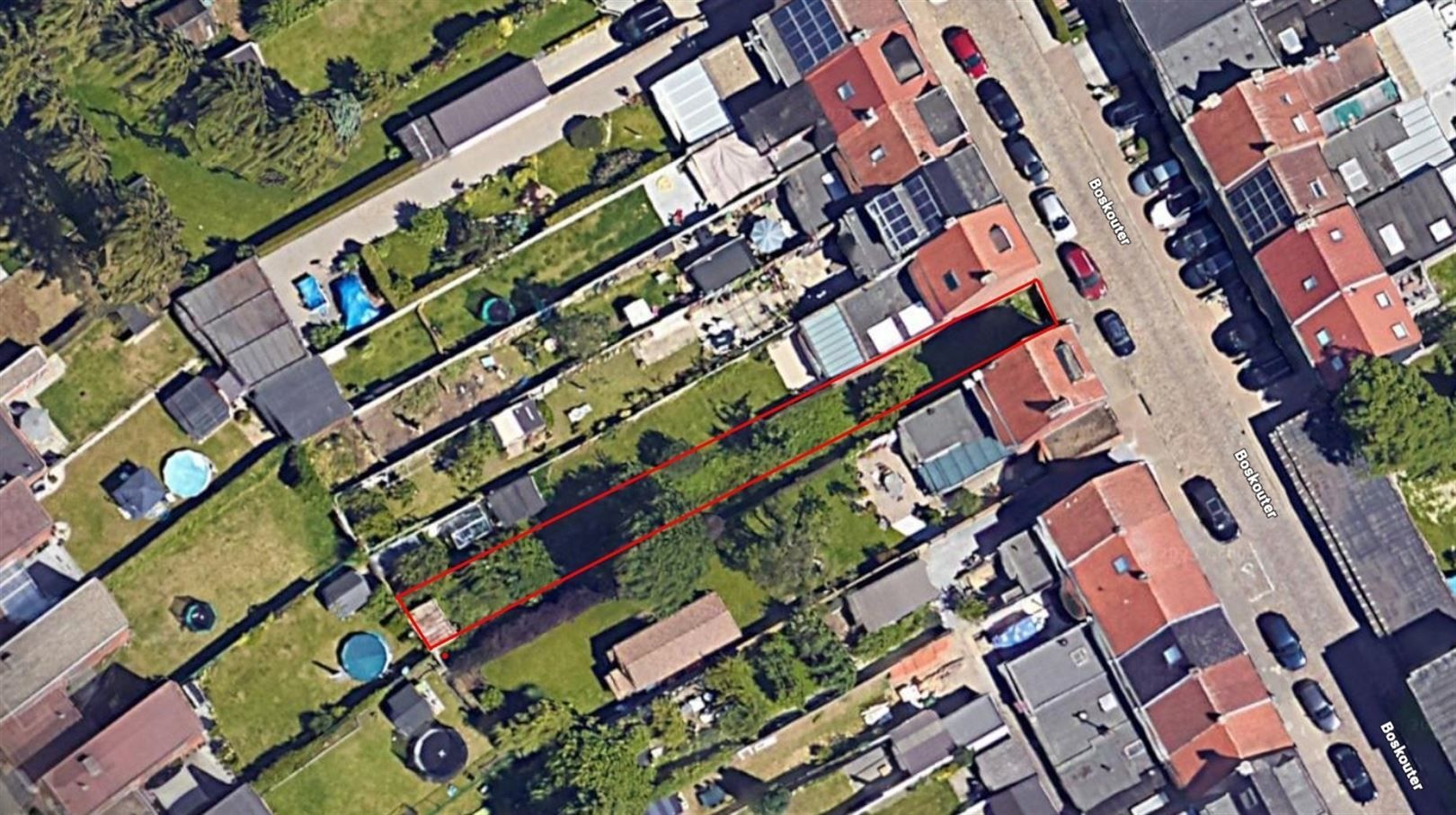 Gunstig gelegen, diep stuk bouwgrond incl.vergunde plannen foto 2