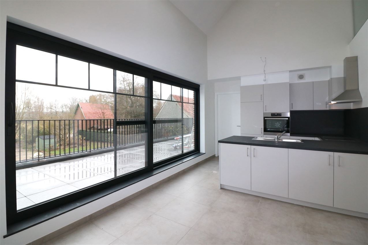 Unieke duplex met twee slpk, terras, autostaanplaats, label A foto 8