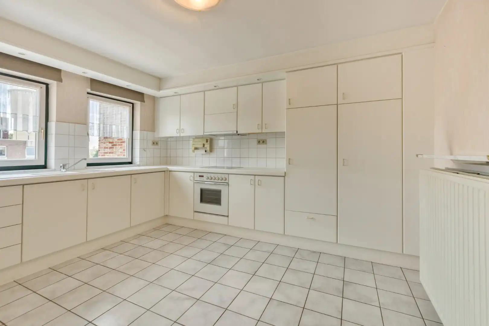 Centraal gelegen appartement met 3 slaapkamers en ruime garage !  foto 9