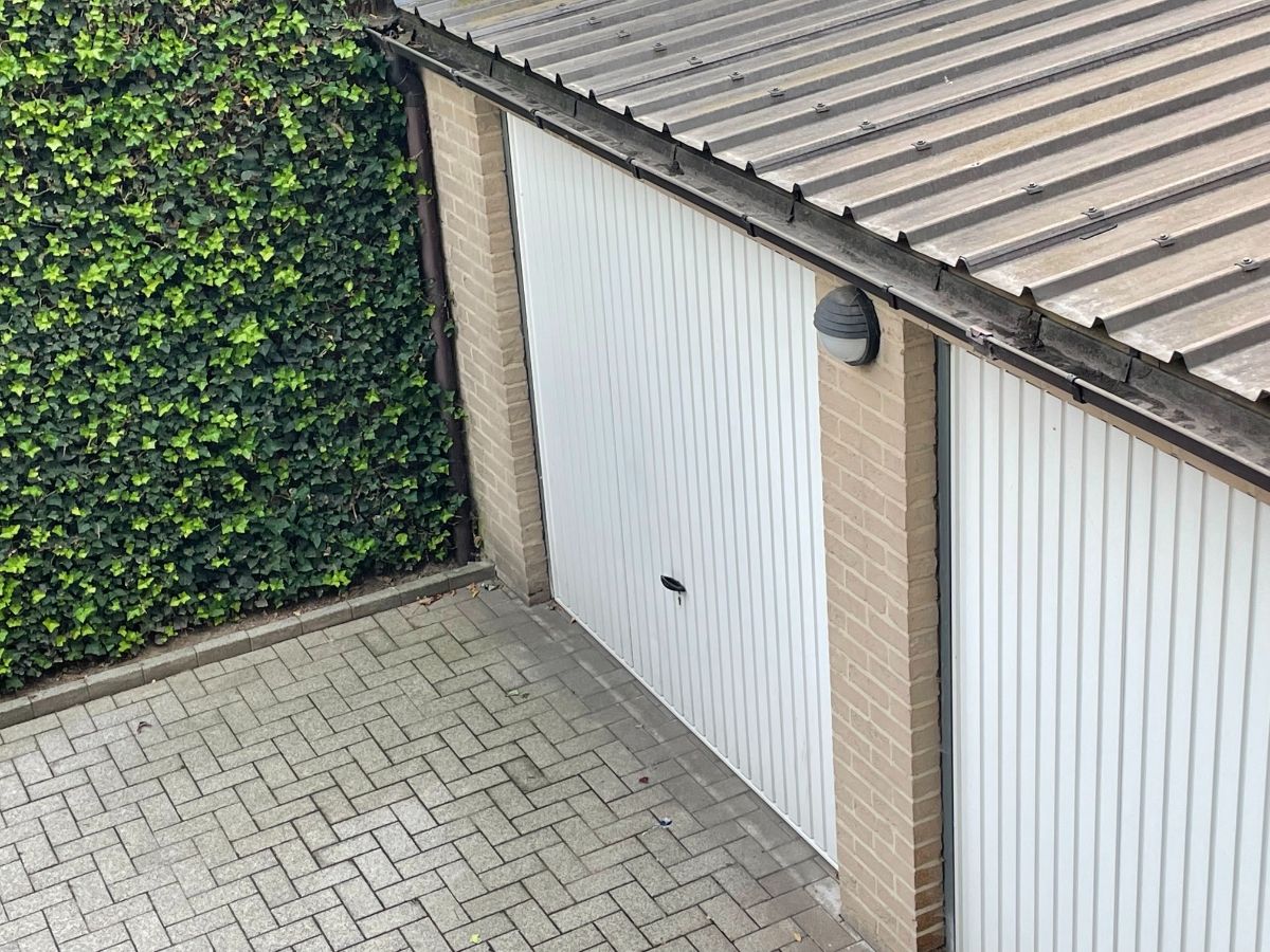 ruim instapklaar twee slaapkamer appartement met groot zongericht terras & gelijkvloerse garage foto 32