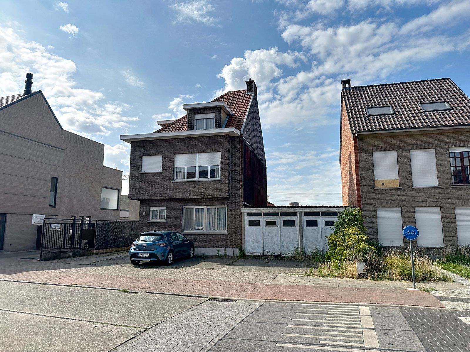Renovatiewoning met (bouw)grond in hart van Schelle foto 3