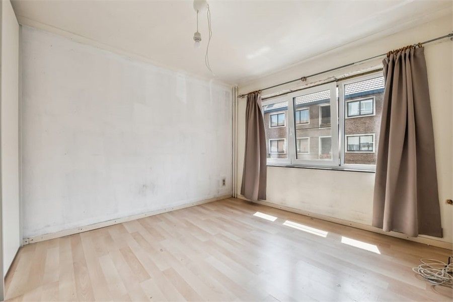 KNUSSE GEZINSWONING MET GEZELLIGE STADSTUIN IN HASSELT foto 18