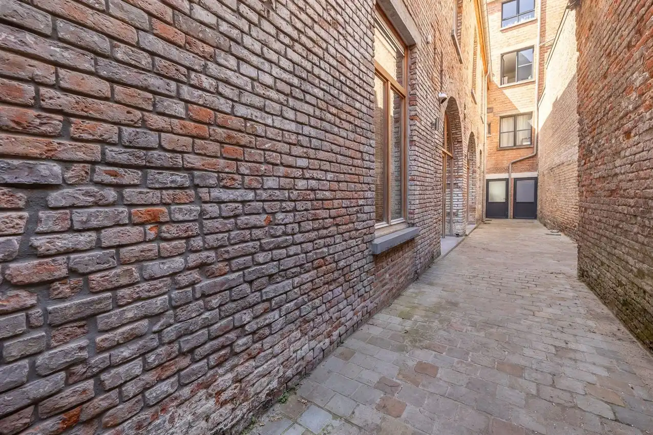 Ruim gelijkvloers appartement met zonnige tuin op toplocatie foto 32
