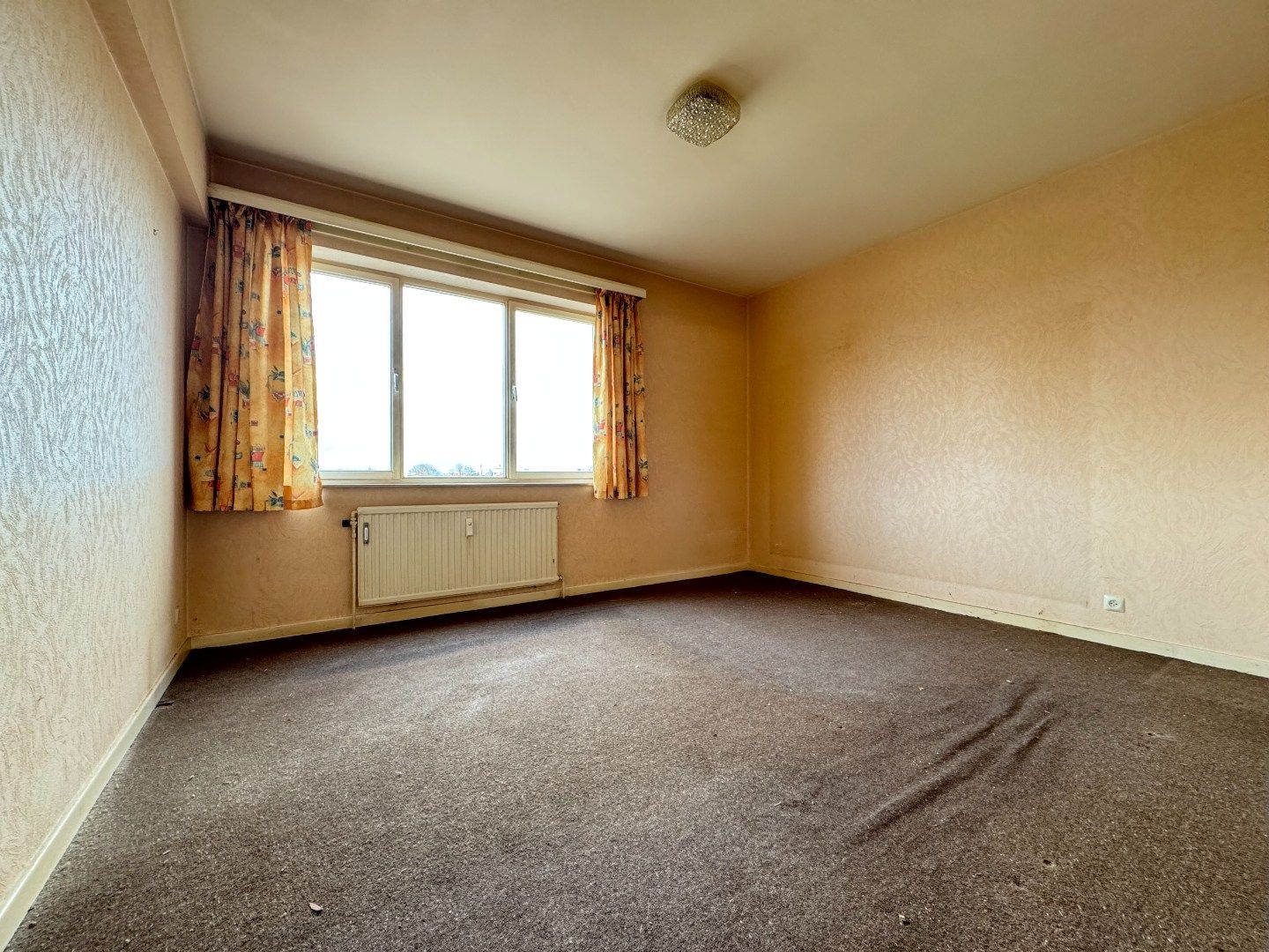 Een lichtrijk 2-SLPK.-appartement met kelder foto 11