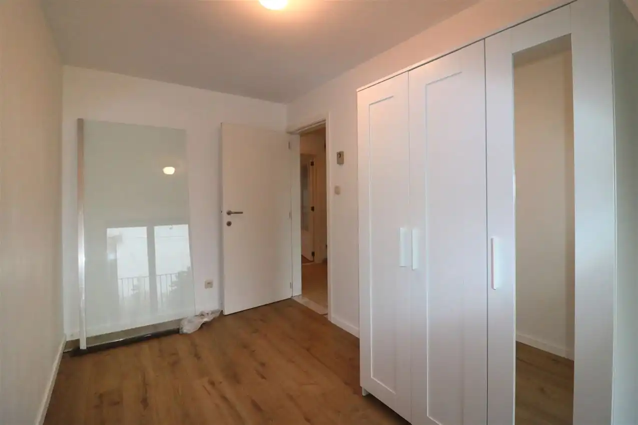Appartement met 2 slpk, terras, tuin en autostaanplaats foto 17