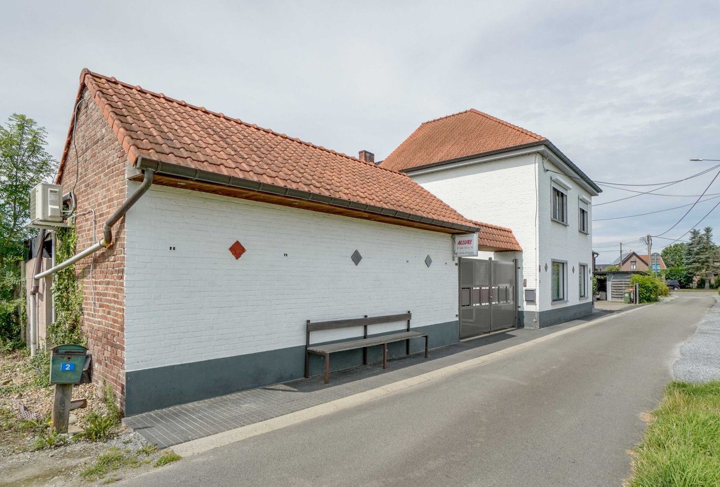 Handelspand met goed onderhouden woning en zwembad te koop in Bilzen foto 2