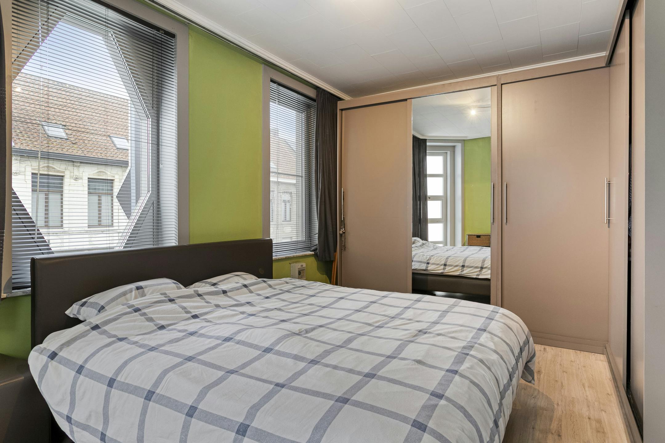 Handelspand met woonst te koop in centrum Menen foto 10