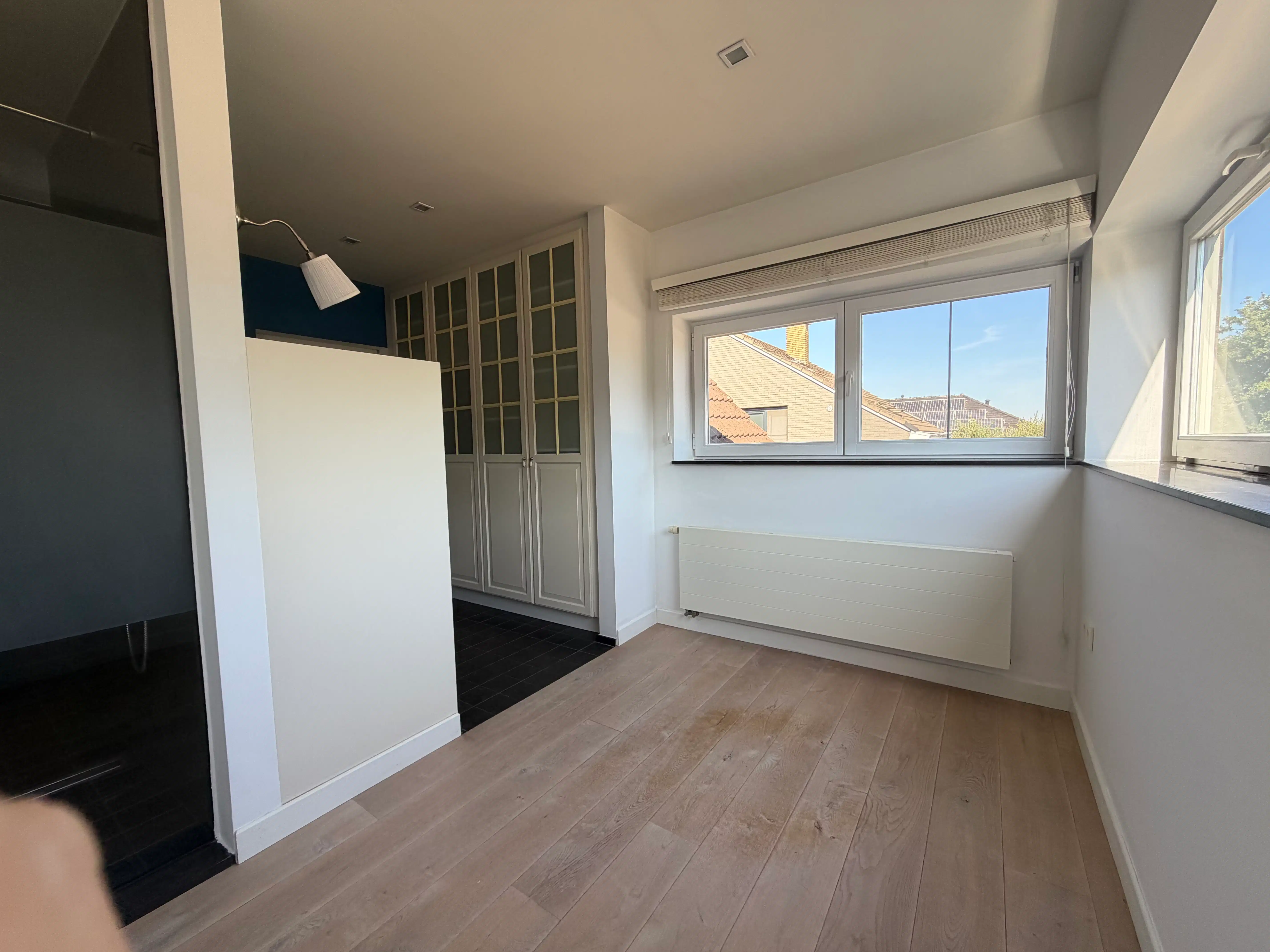 Halfopen woning met 3 slaapkamers, tuin en carport foto 13