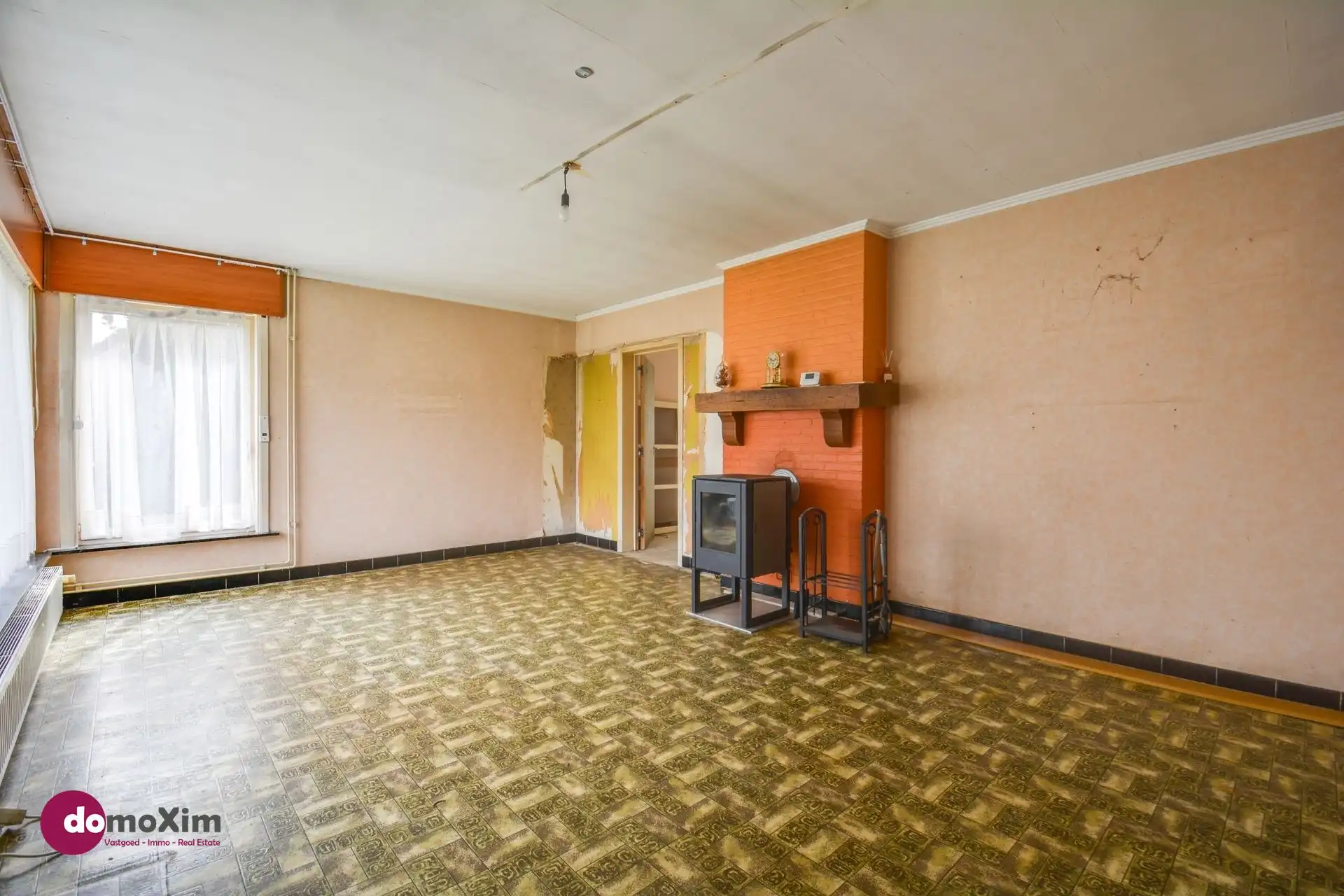 Te renoveren woning met garage in Boortmeerbeek foto 2