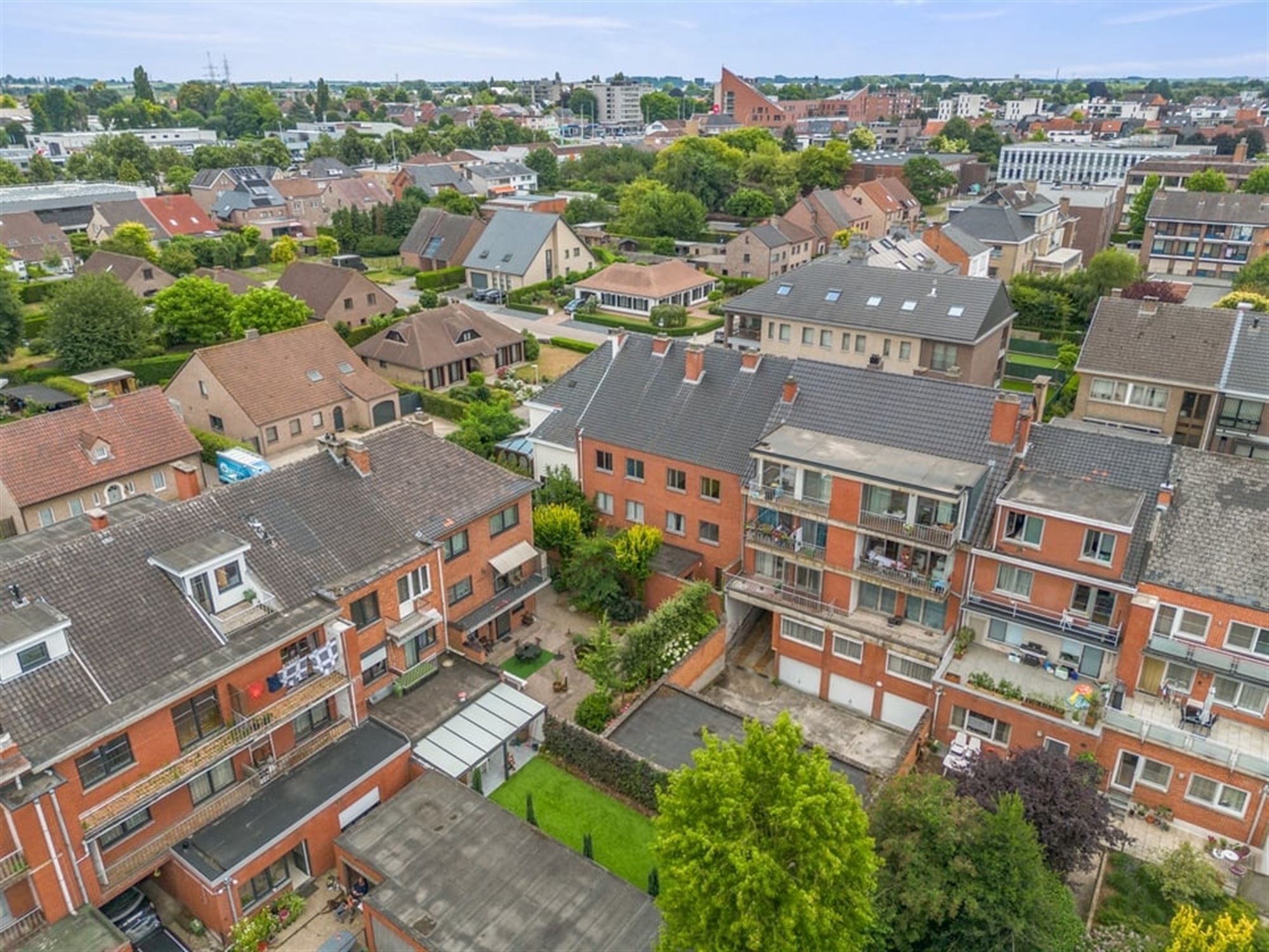 OPBRENGSTEIGENDOM MET 6 APPARTEMENTEN EN 4 STAANPLAATSEN IN SINT-TRUIDEN  foto 6