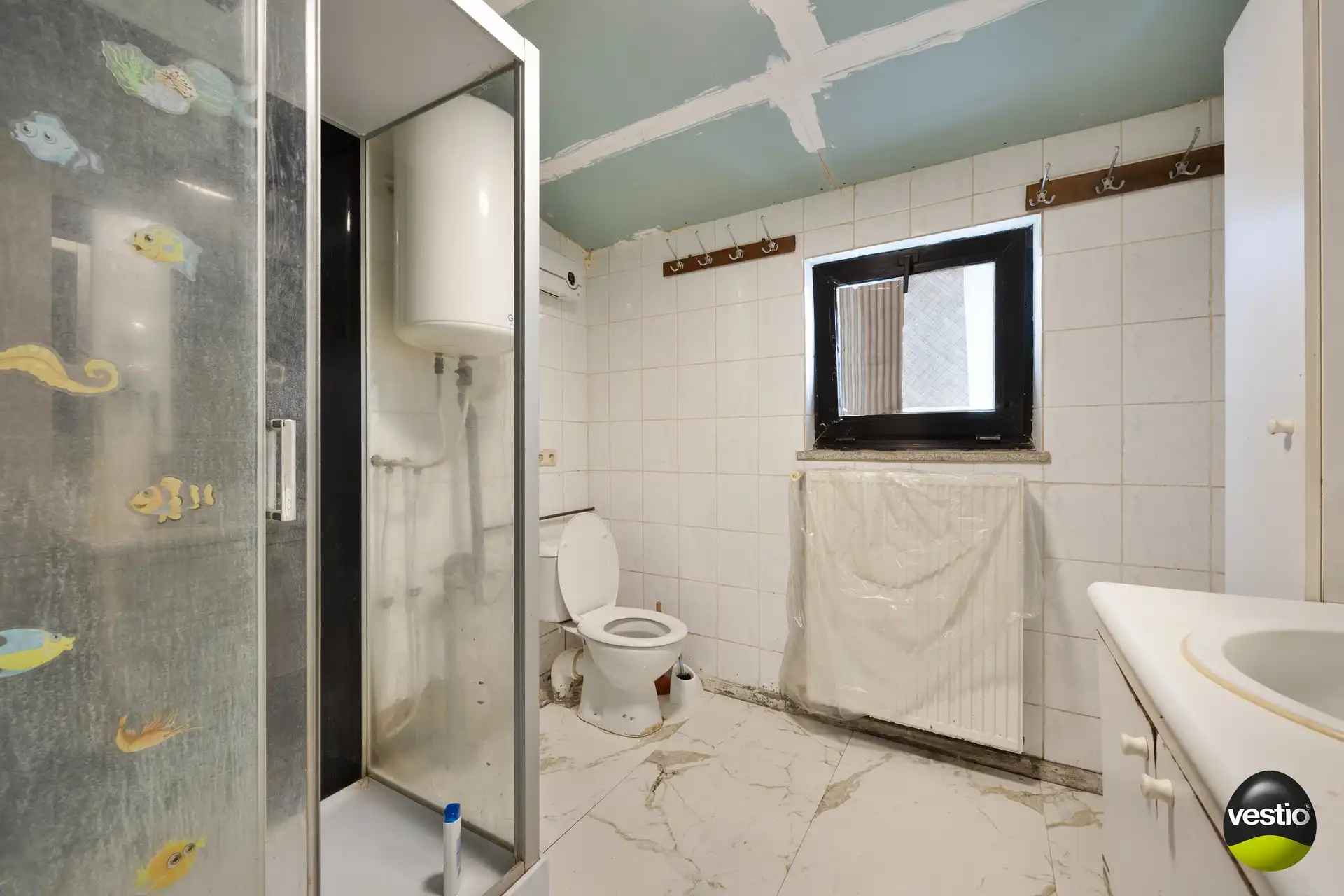 TE RENOVEREN RIJWONING IN HET CENTRUM VAN SINT-TRUIDEN foto 12