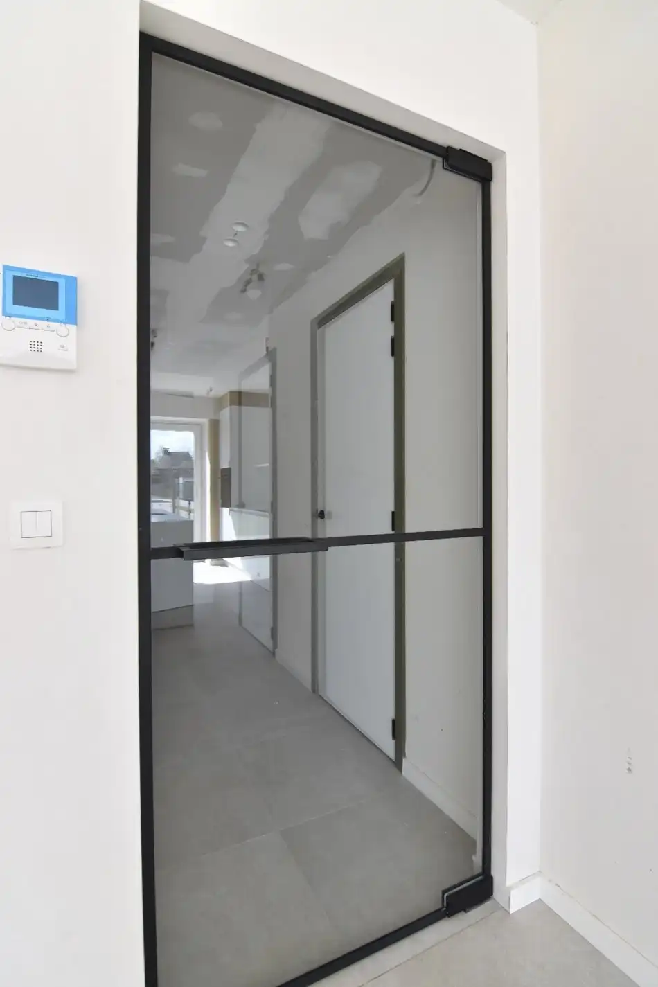 Nieuwbouwappartement gelijkvloers - één slaapkamer foto 11