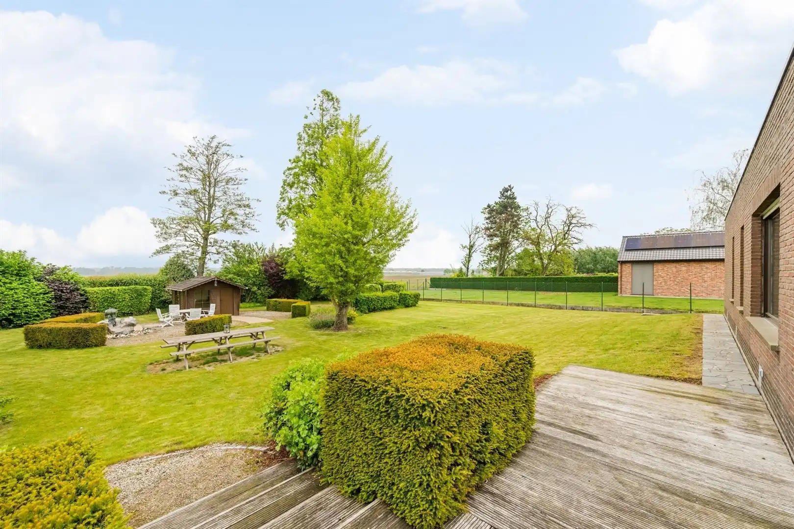 Bungalow in een oase van groen foto 18