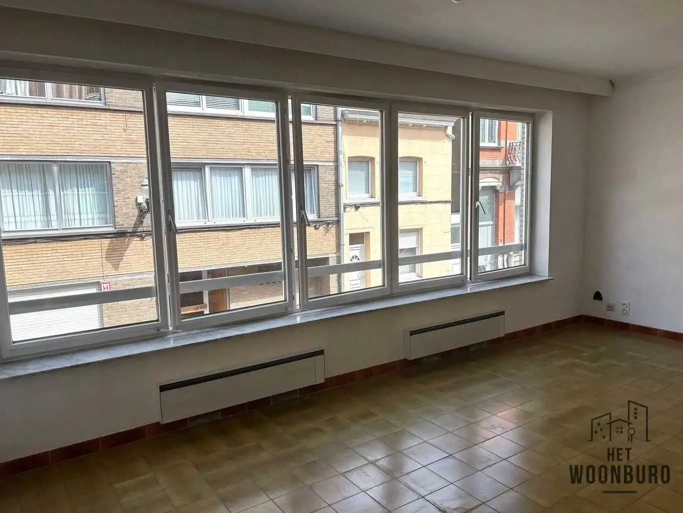 Appartement 1e verd. met terras en kelder foto 4